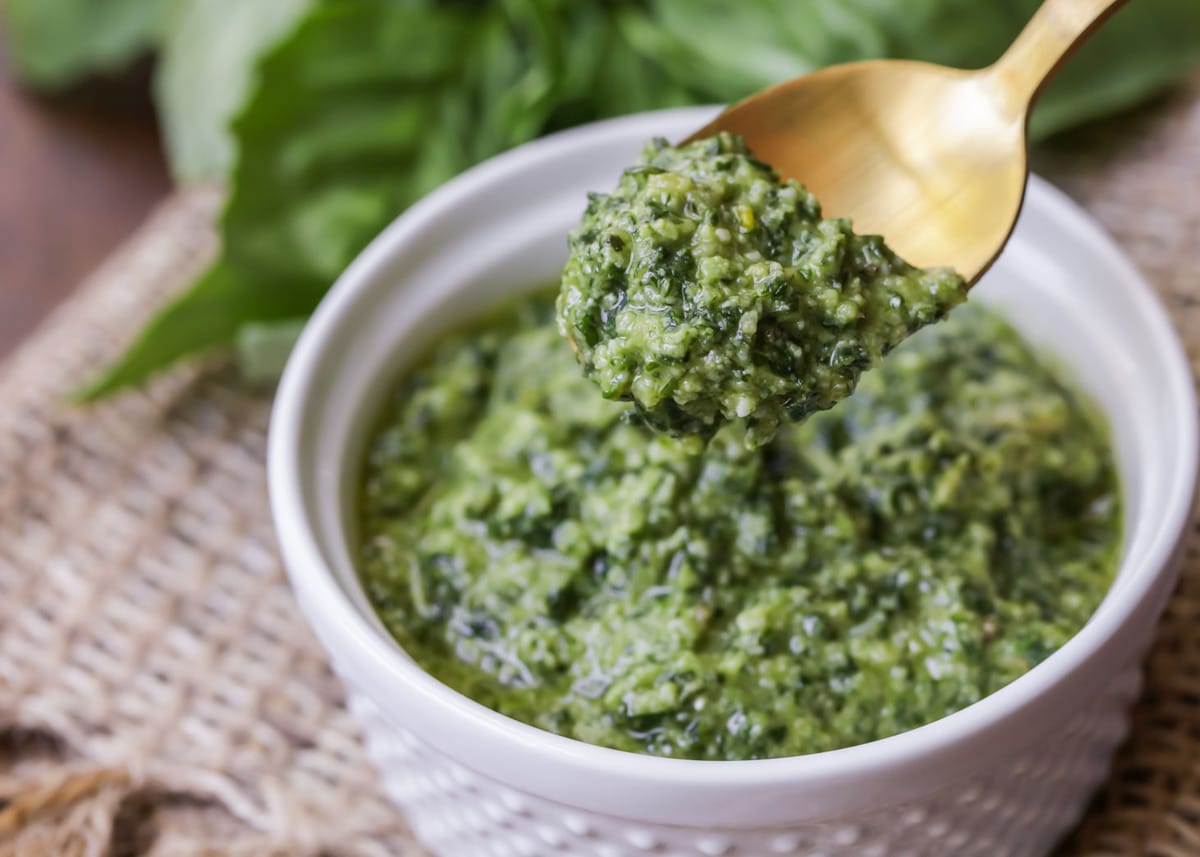 Basil pesto in a white bowl