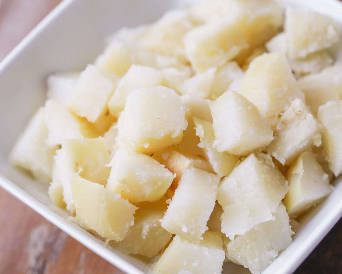 Potato chopped in cubes for potato salad recipe.