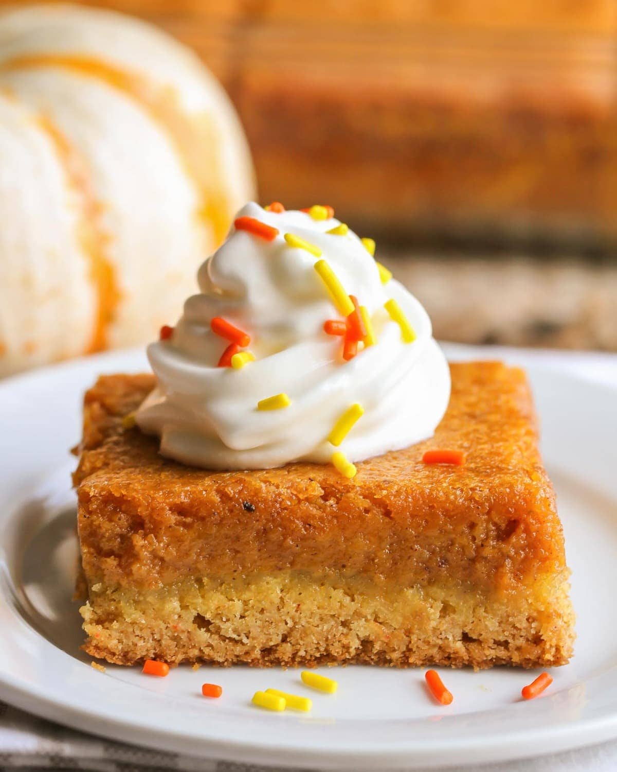 Pumpkin Gooey Butter Cake recipe on white plate