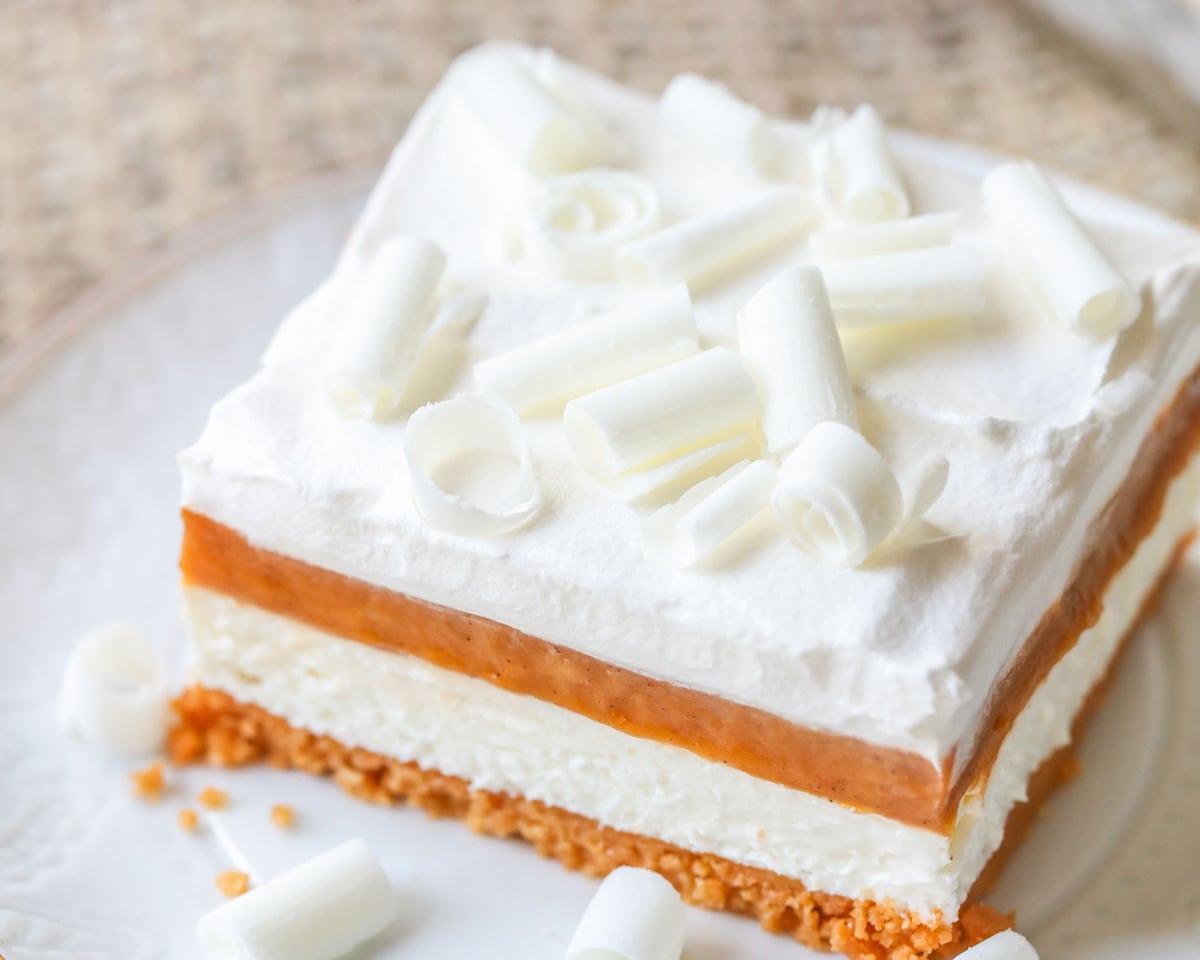 Pumpkin recipes - slice of pumpkin lasagna topped with white chocolate curls.