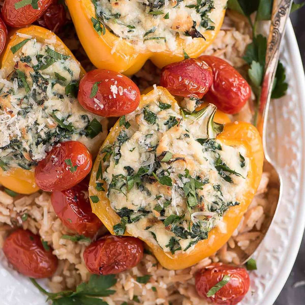 Stuffed Peppers served over a bed of white rice