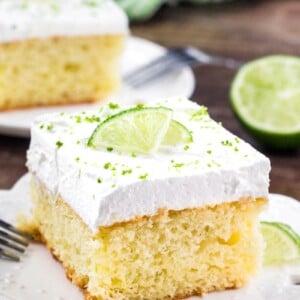 Super easy key lime cake is bursting with fresh lime flavor and topped with whipped cream. It's a delicious summer cake recipe, and if you love key lime pie - then definitely give this recipe a try. 