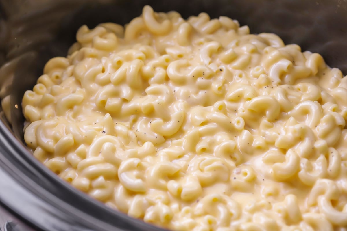 Easy crock pot mac and cheese inside a slow cooker.