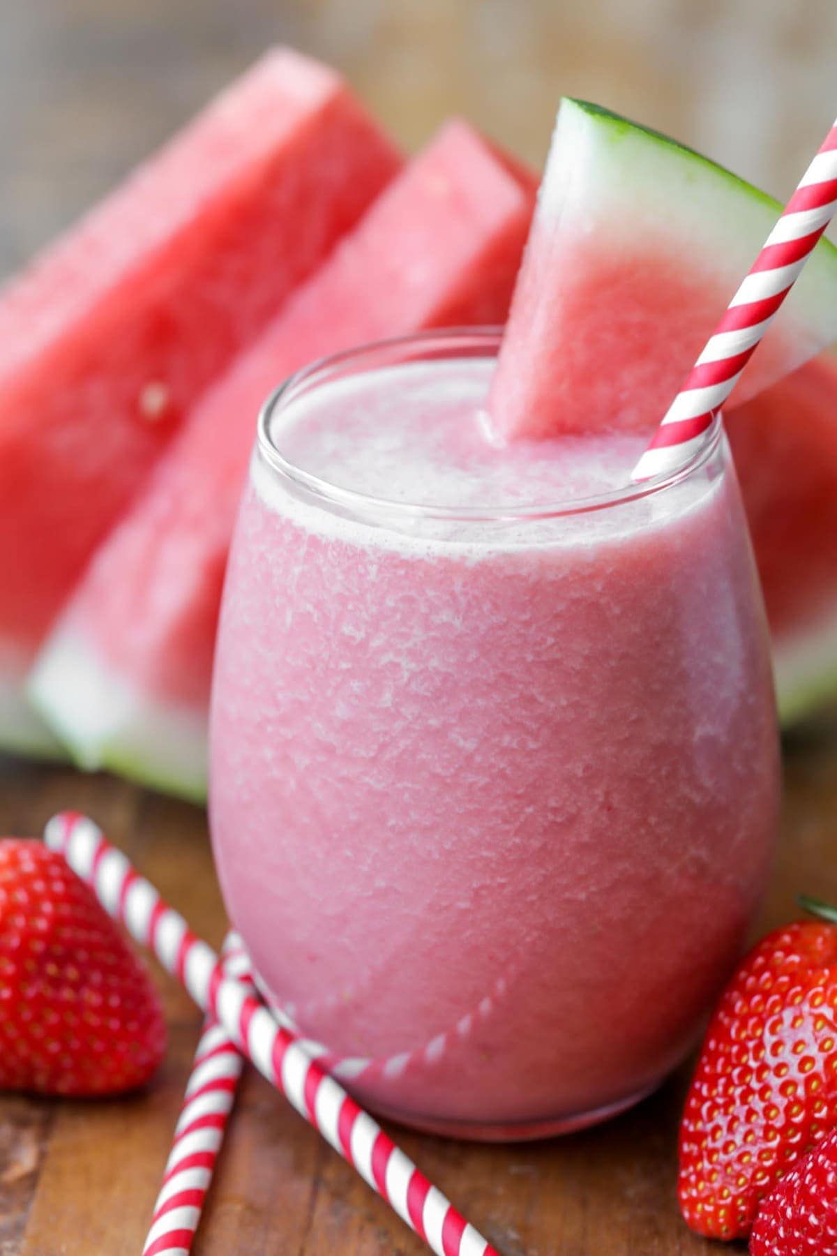 Watermelon Smoothie in a glass with a watermelon slice garnish.