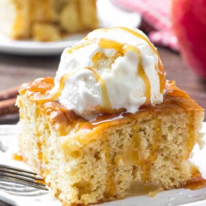 This Easy Apple Cake is extra moist and filled with cinnamon and apples. Top it off with ice cream and caramel sauce for the perfect fall treat! 