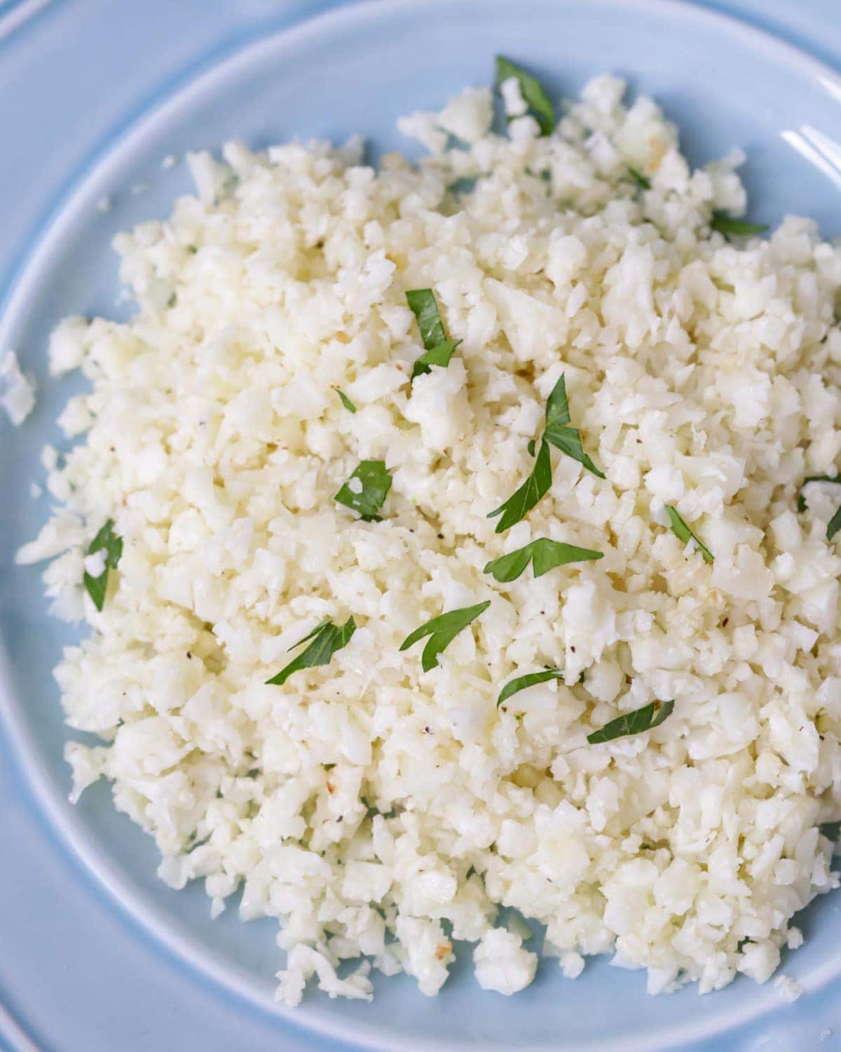 Cauliflower Rice on a blue plate