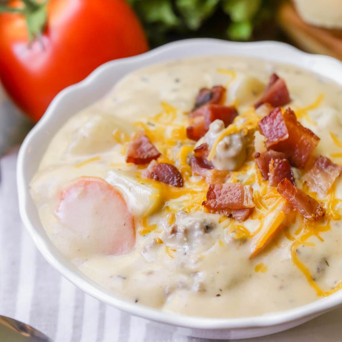 Easy soup recipes - Close up of cheeseburger soup topped with bacon.