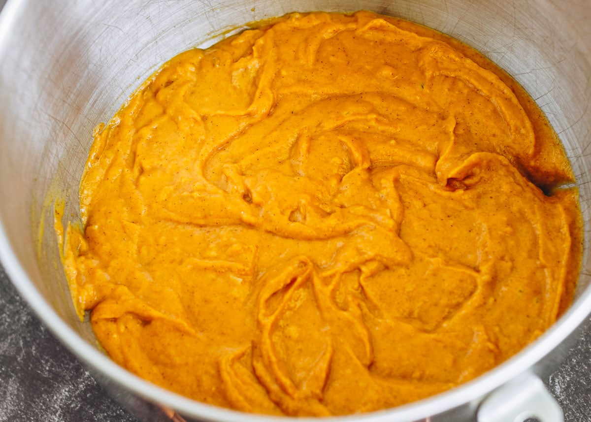 Pumpkin cake batter in mixing bowl