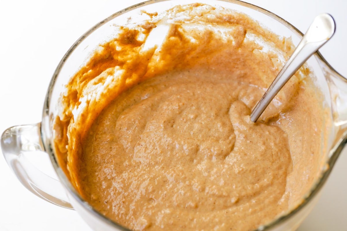 Pumpkin Pancake Mix in a measuring cup.