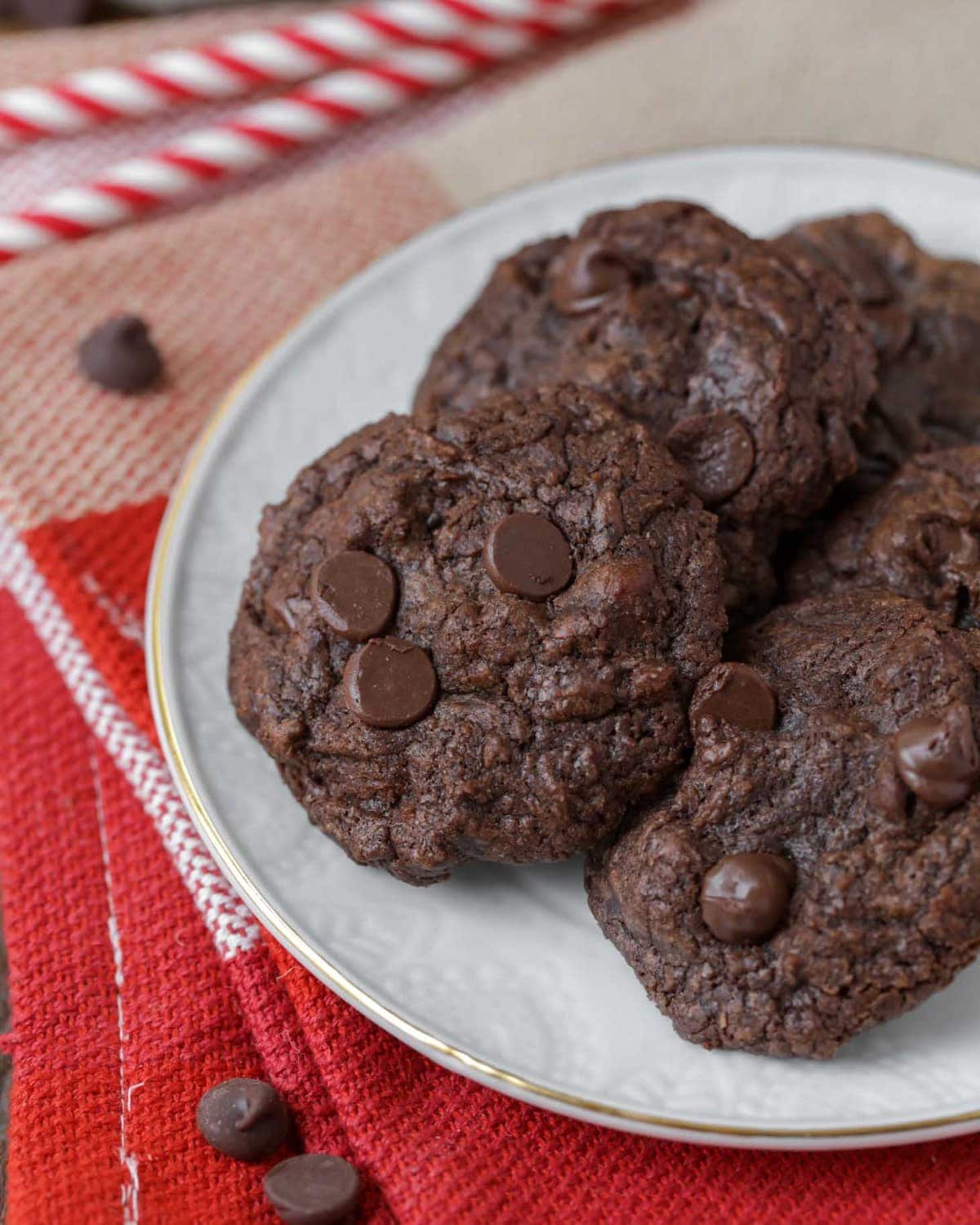 Chocolate brownie cookies on a white plate.