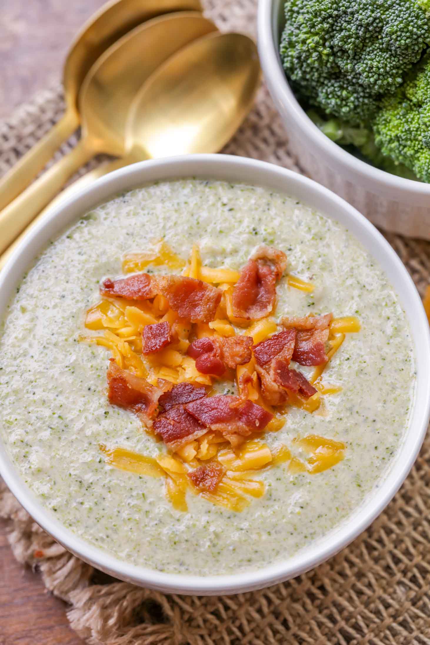 Cream of Broccoli Soup topped with bacon bits and shredded cheese