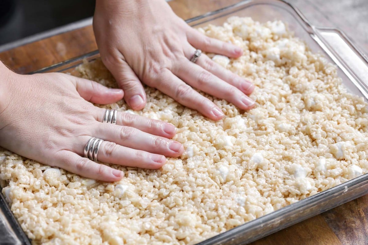 Rice Krispie Treats recipe pressed in a glass baking dish.