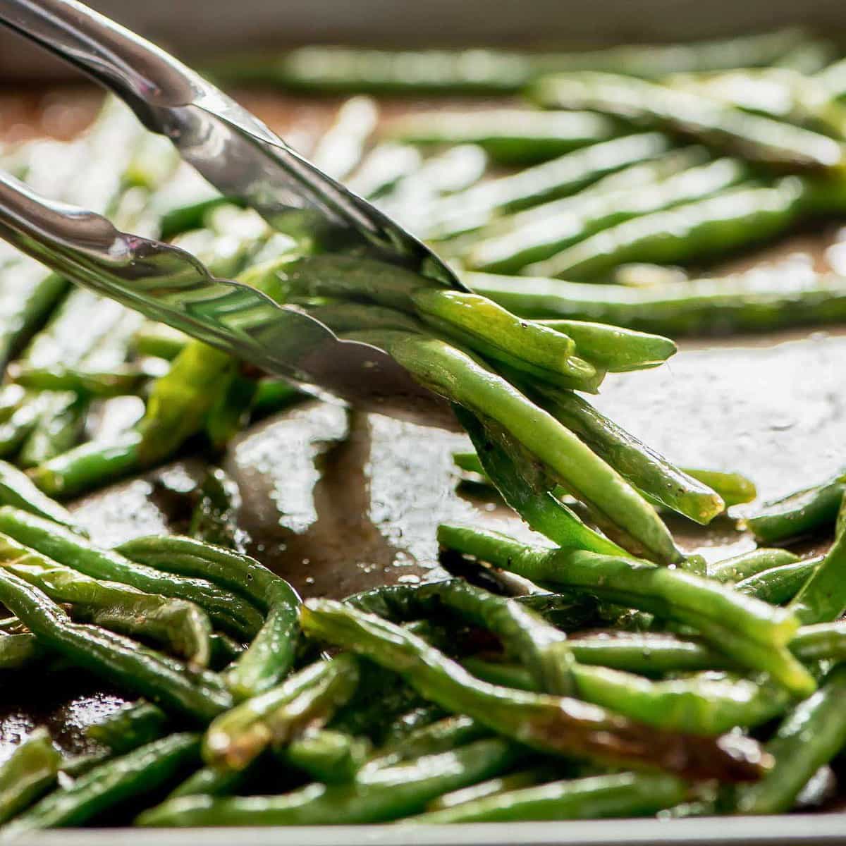 Vegetable side dishes - a sheet pan of roasted green beans.