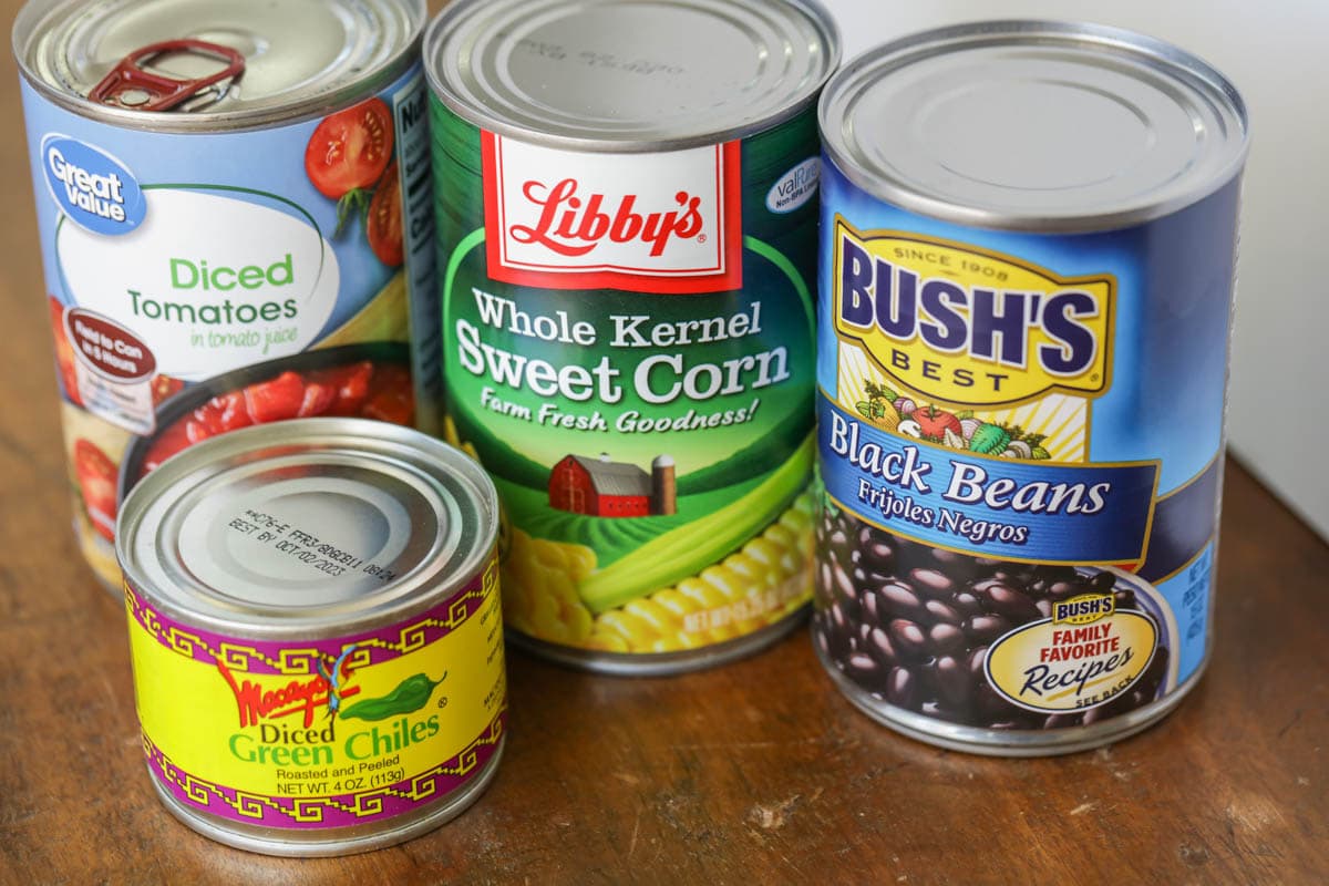 Cans of diced tomatoes, whole kernel sweet corn, black beans, and diced green chiles. 