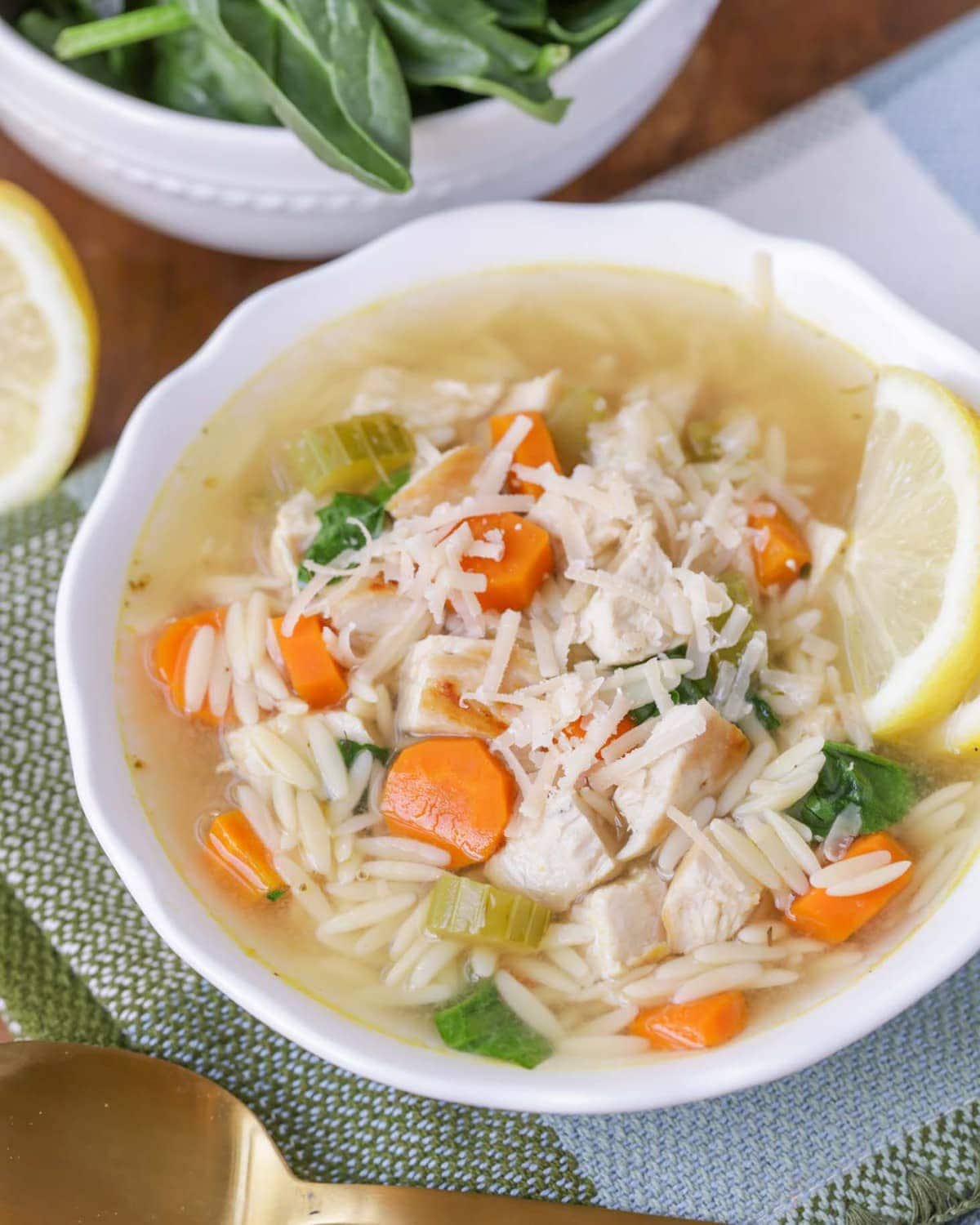 Lemon Orzo Chicken Soup served up in a white bowl