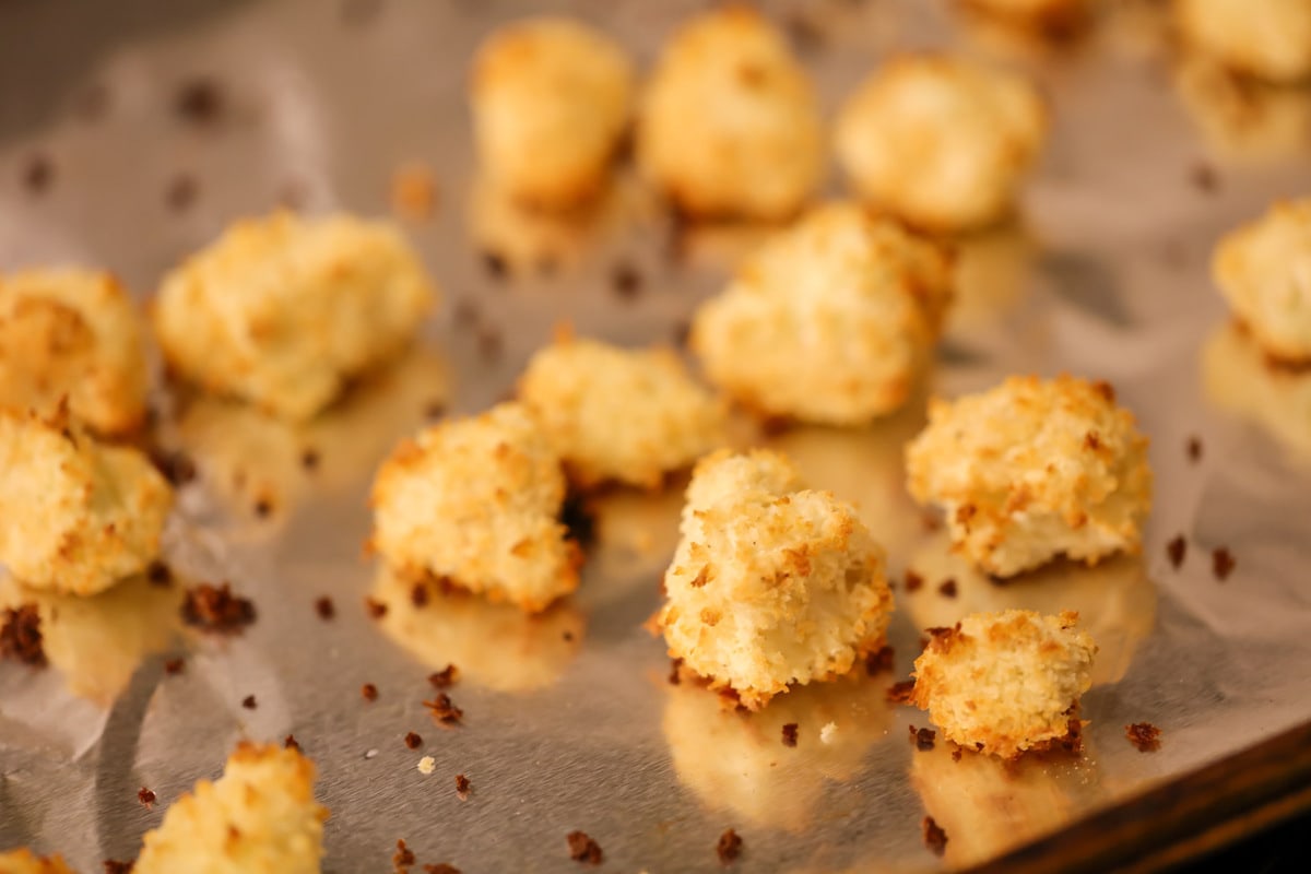 Crispy buffalo cauliflower baked on baking sheet