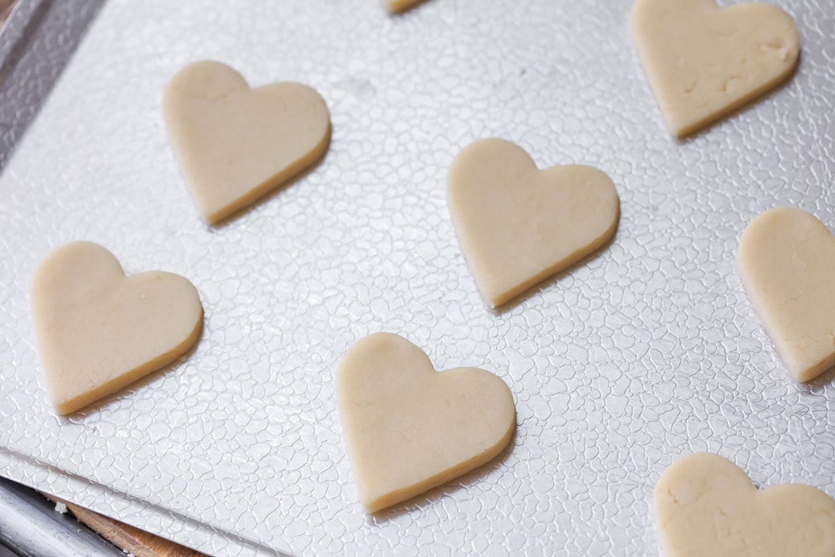 heart shaped cookies on a sheet pan