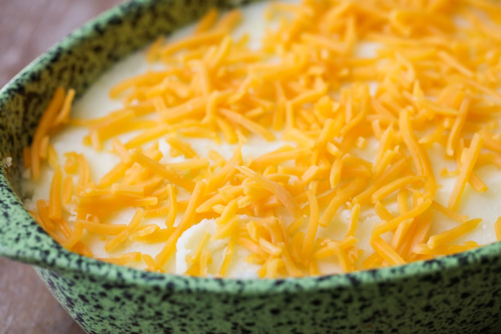 Baked mashed potatoes in casserole dish