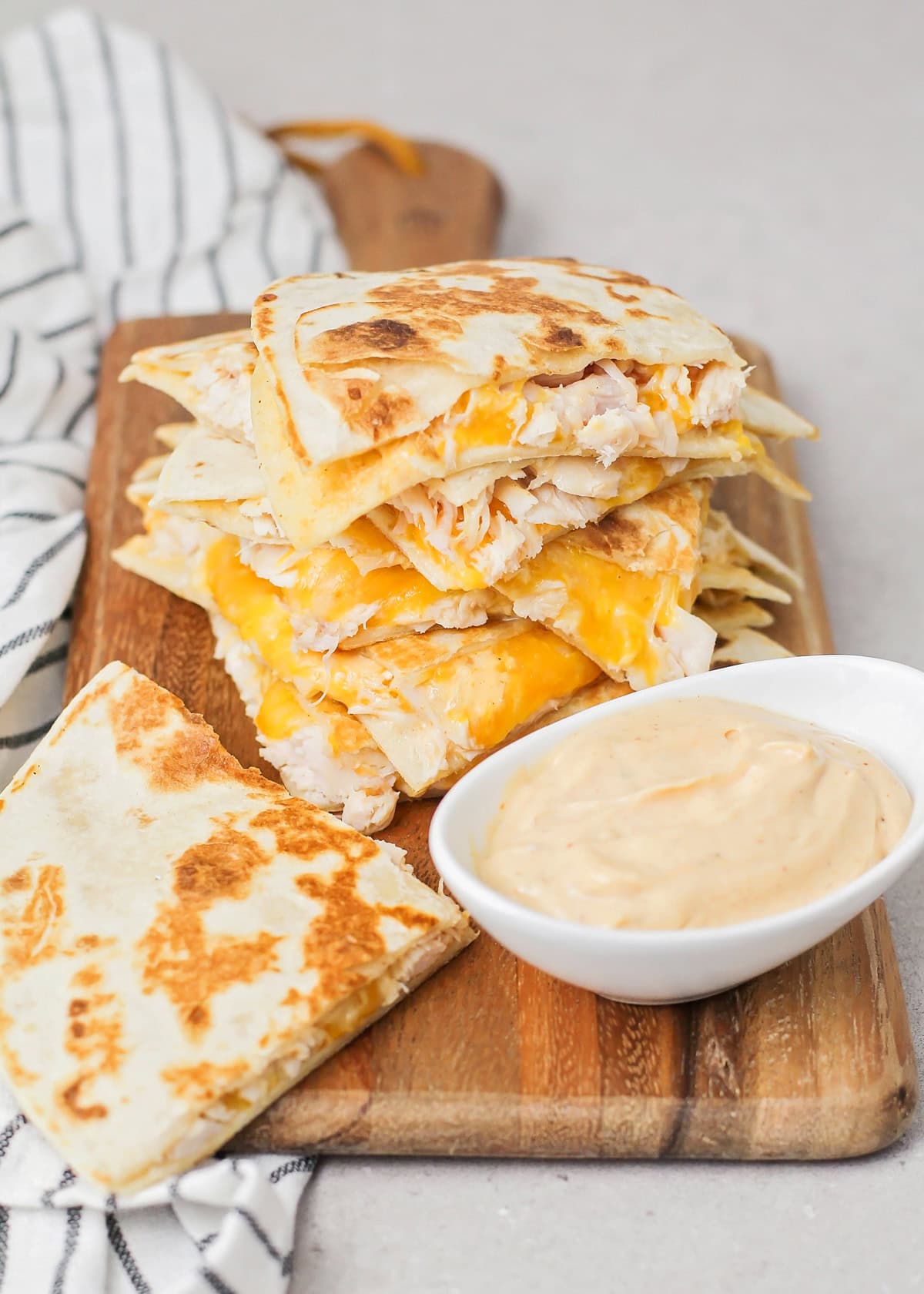 Chicken Quesadillas on a cutting board
