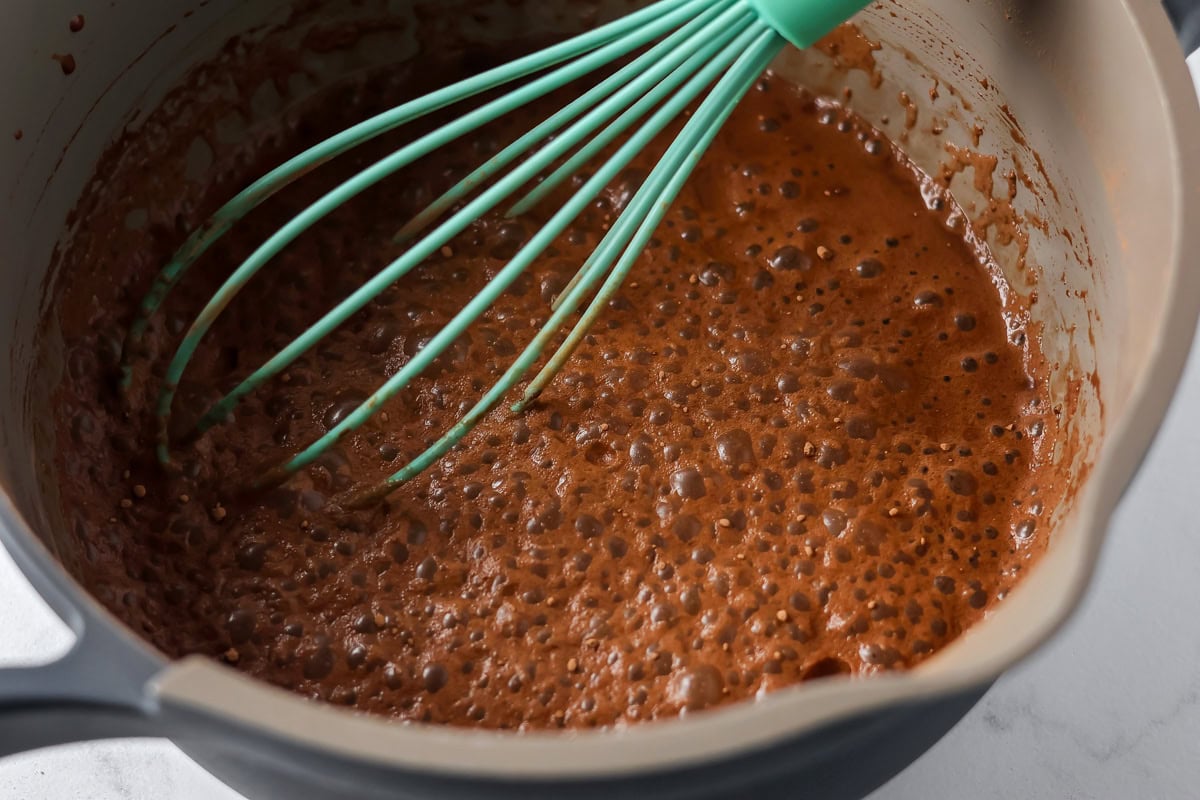 Ingredients heating up in pan for Mexican hot cocoa.