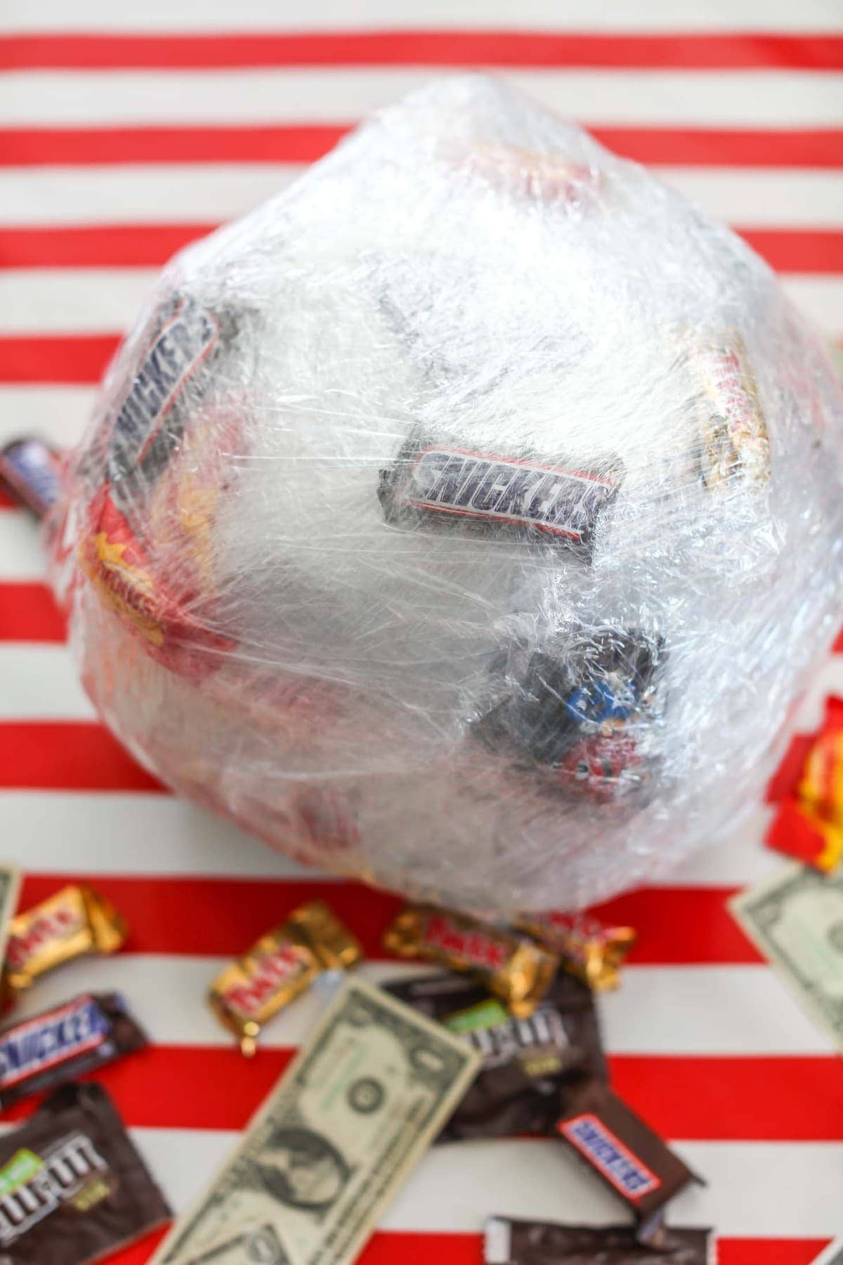 Saran Wrap Game ball wrapped and filled with prizes.