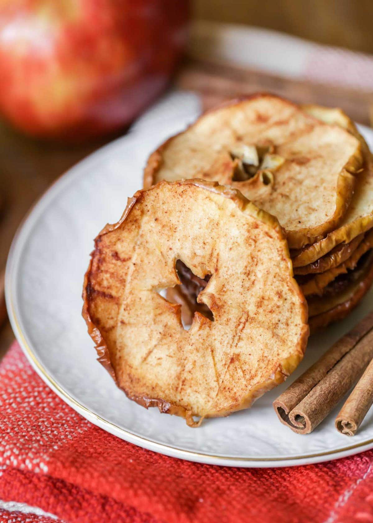 Baked Apple Chips Recipe stacked on plate