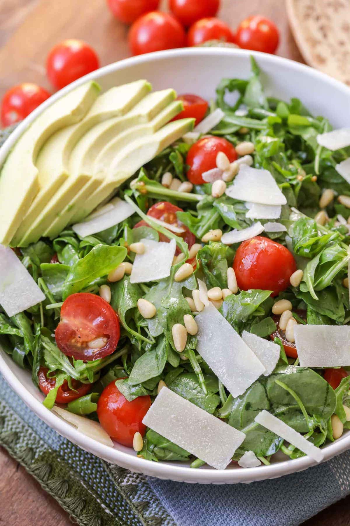 Simple Arugula Salad in a white bowl