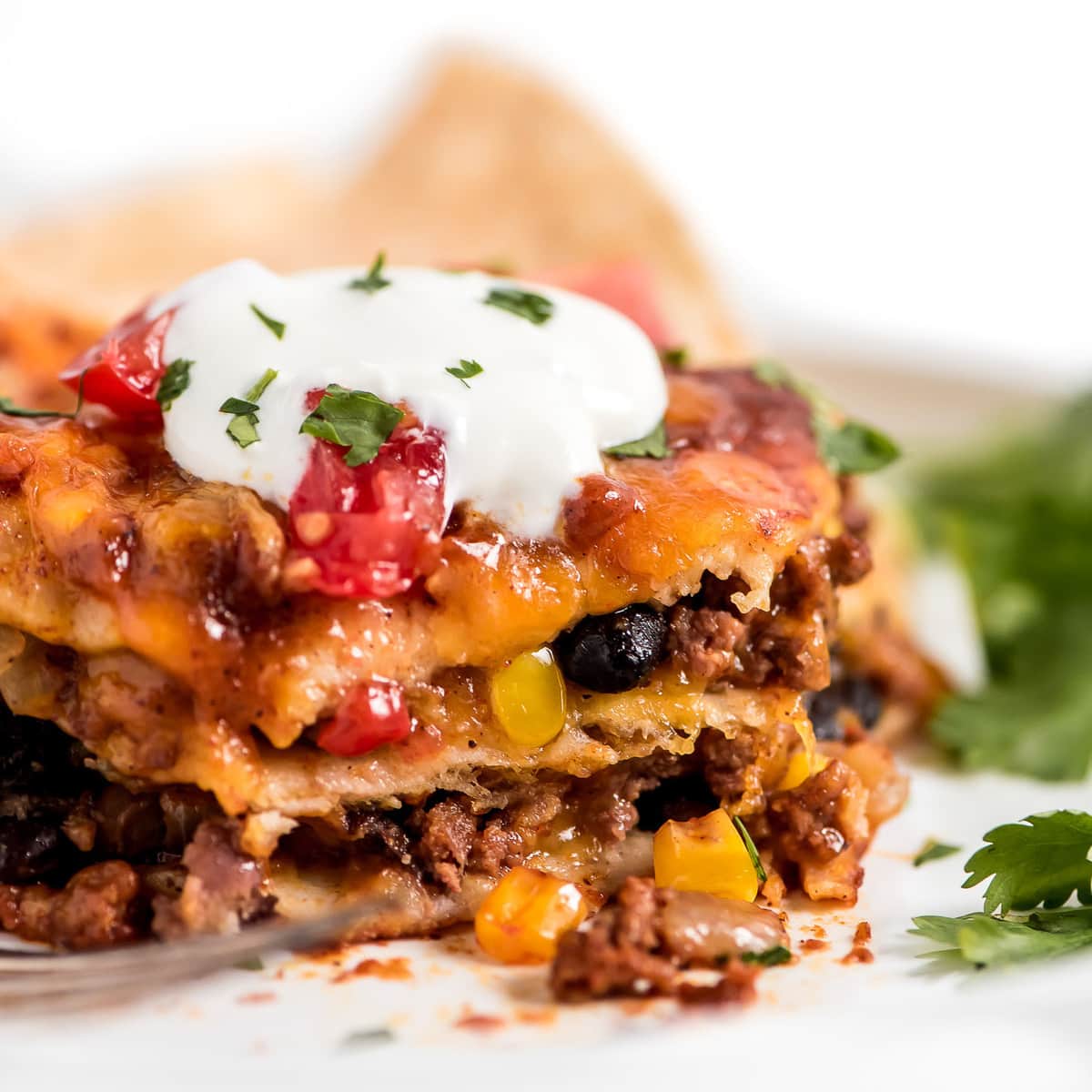 Layered Enchilada Casserole recipe on plate.