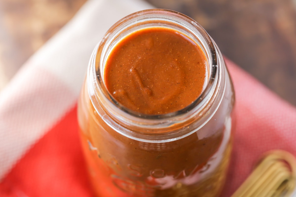 Red Enchilada Sauce in a glass mason jar.