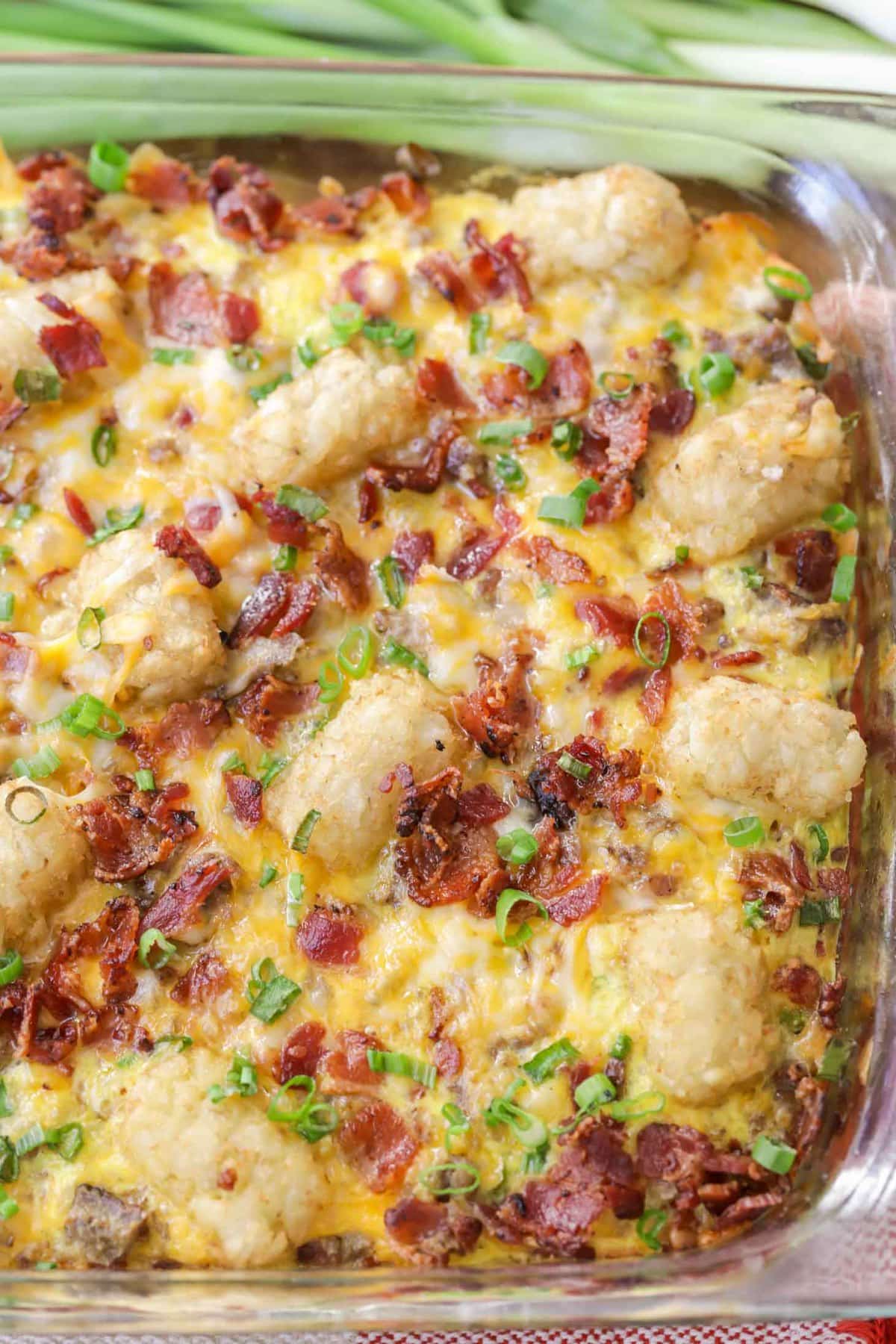 Tater Tot Sausage Breakfast Casserole baked in a baking dish.