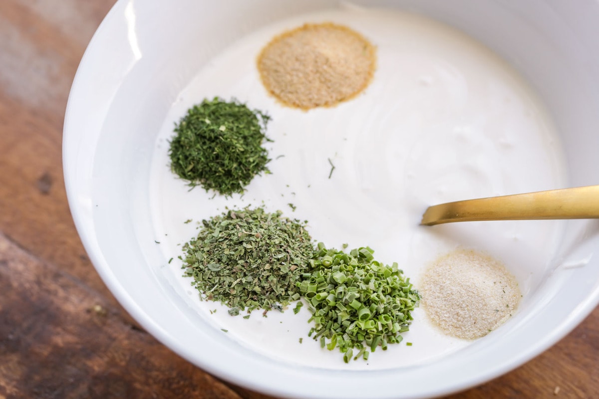 Homemade ranch dressing seasoning ingredients in bowl.