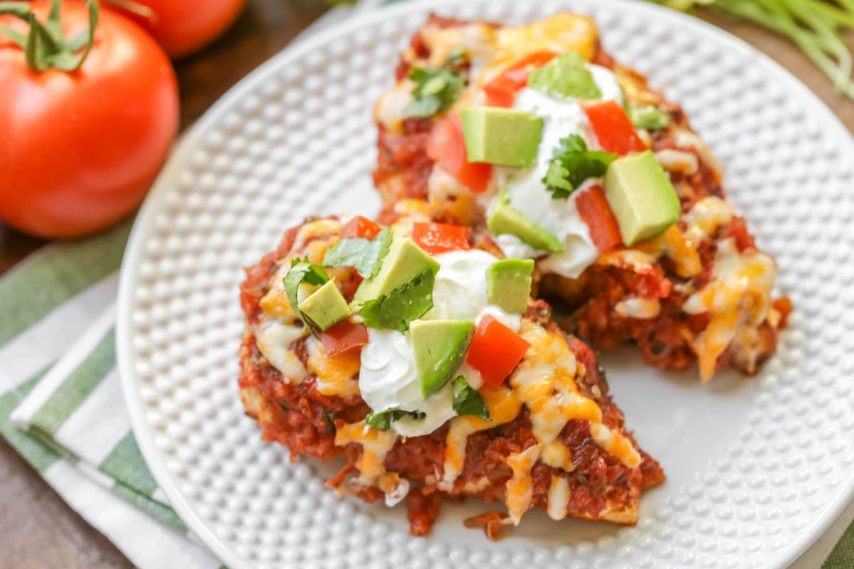 Salsa chicken topped with sour cream and avocado