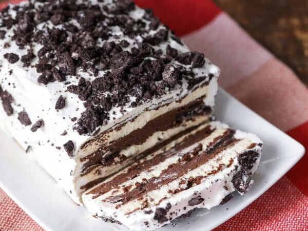 Ice Cream Sandwich Cake sliced on white platter.