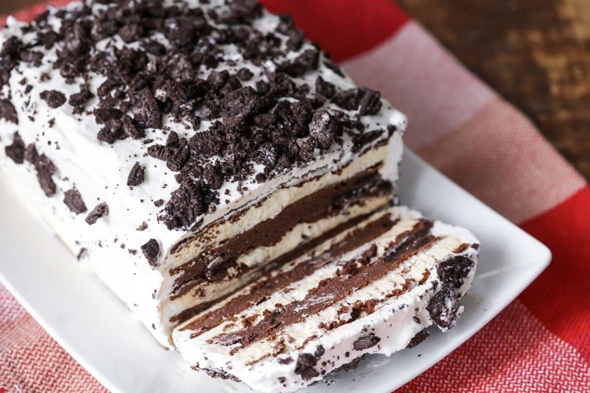 4th of July Desserts - Ice cream sandwich cake cut into slices on a white serving platter.