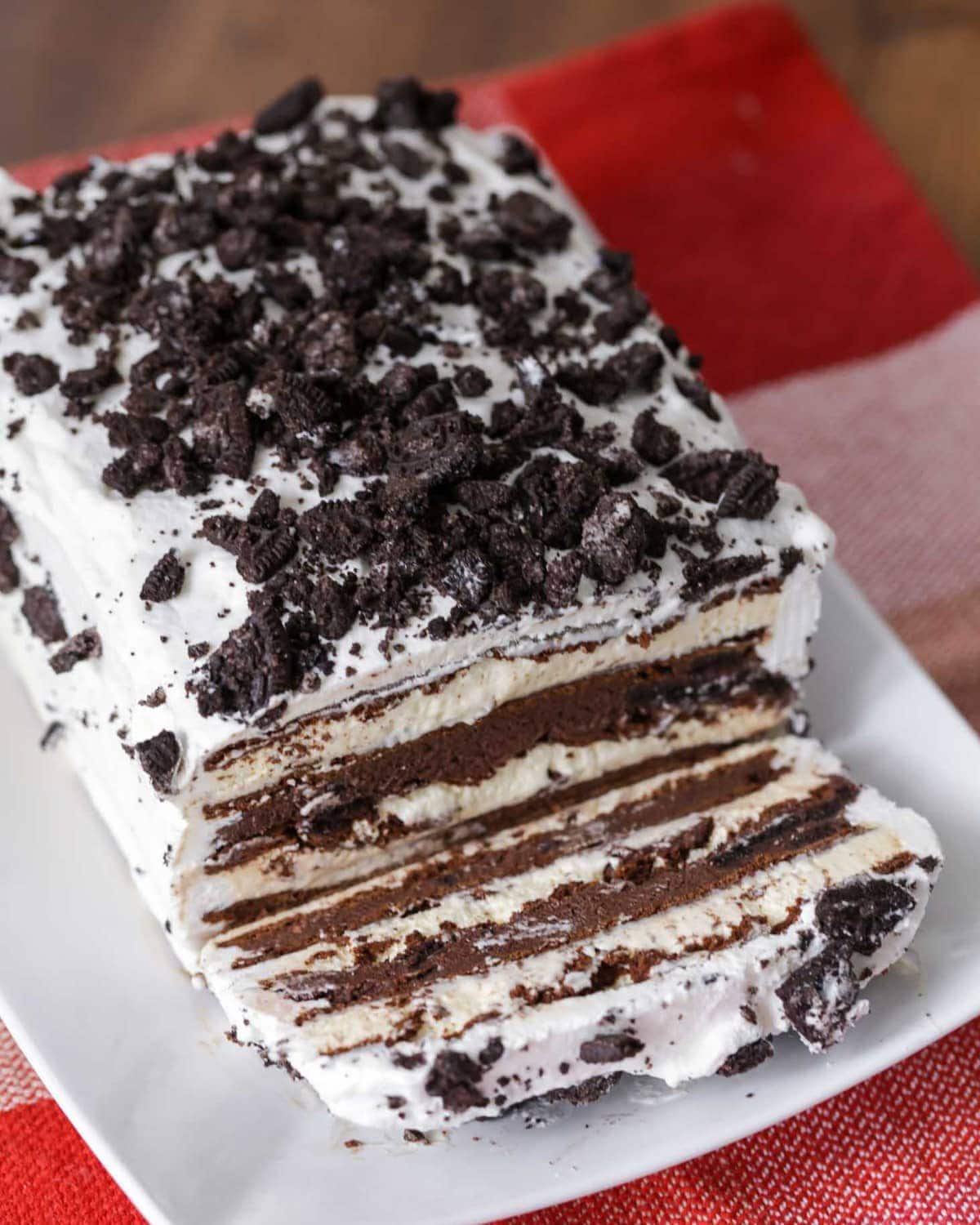 Ice Cream Sandwich Cake topped with Oreos.