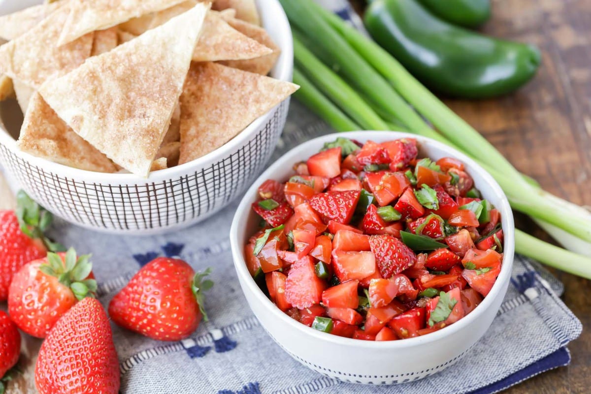 Strawberry Salsa served in a bowl with chips.