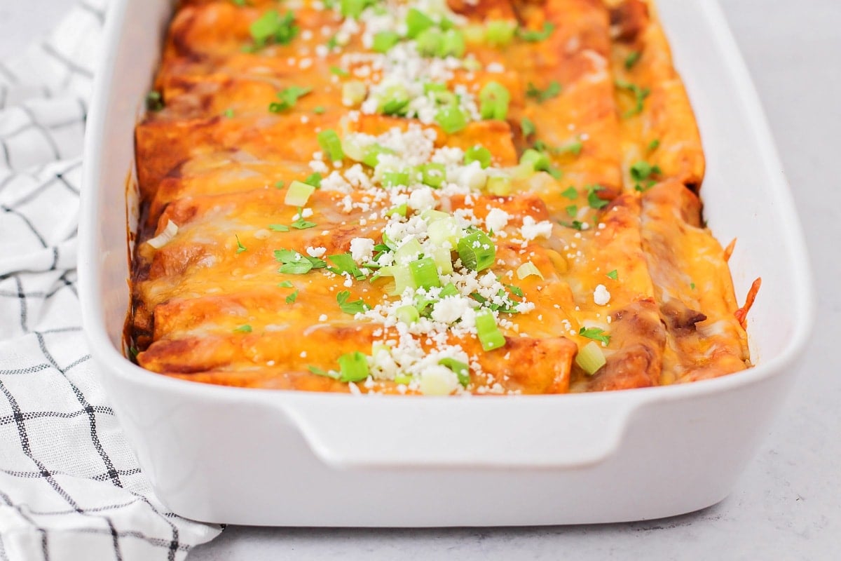 Red Cheese Enchiladas in a glass baking dish
