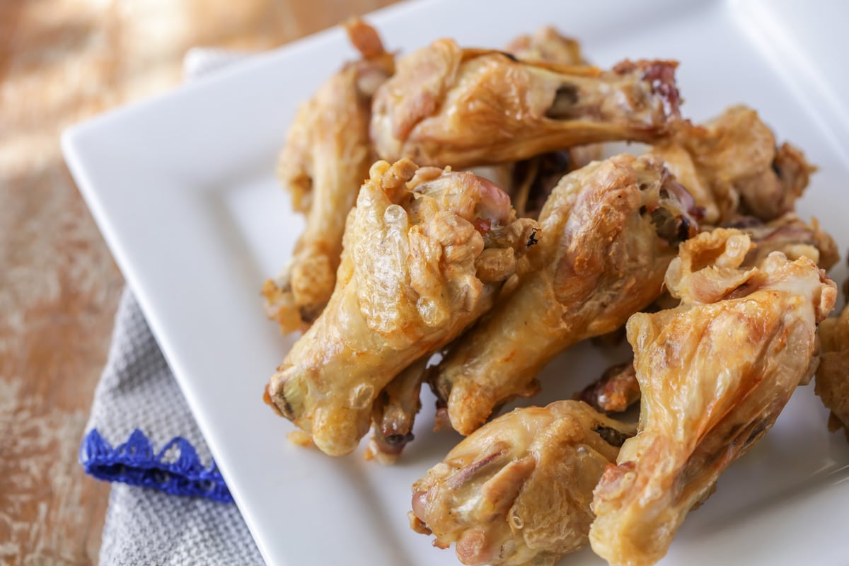 Healthy Appetizers - Baked Chicken Wings on a square white plate. 