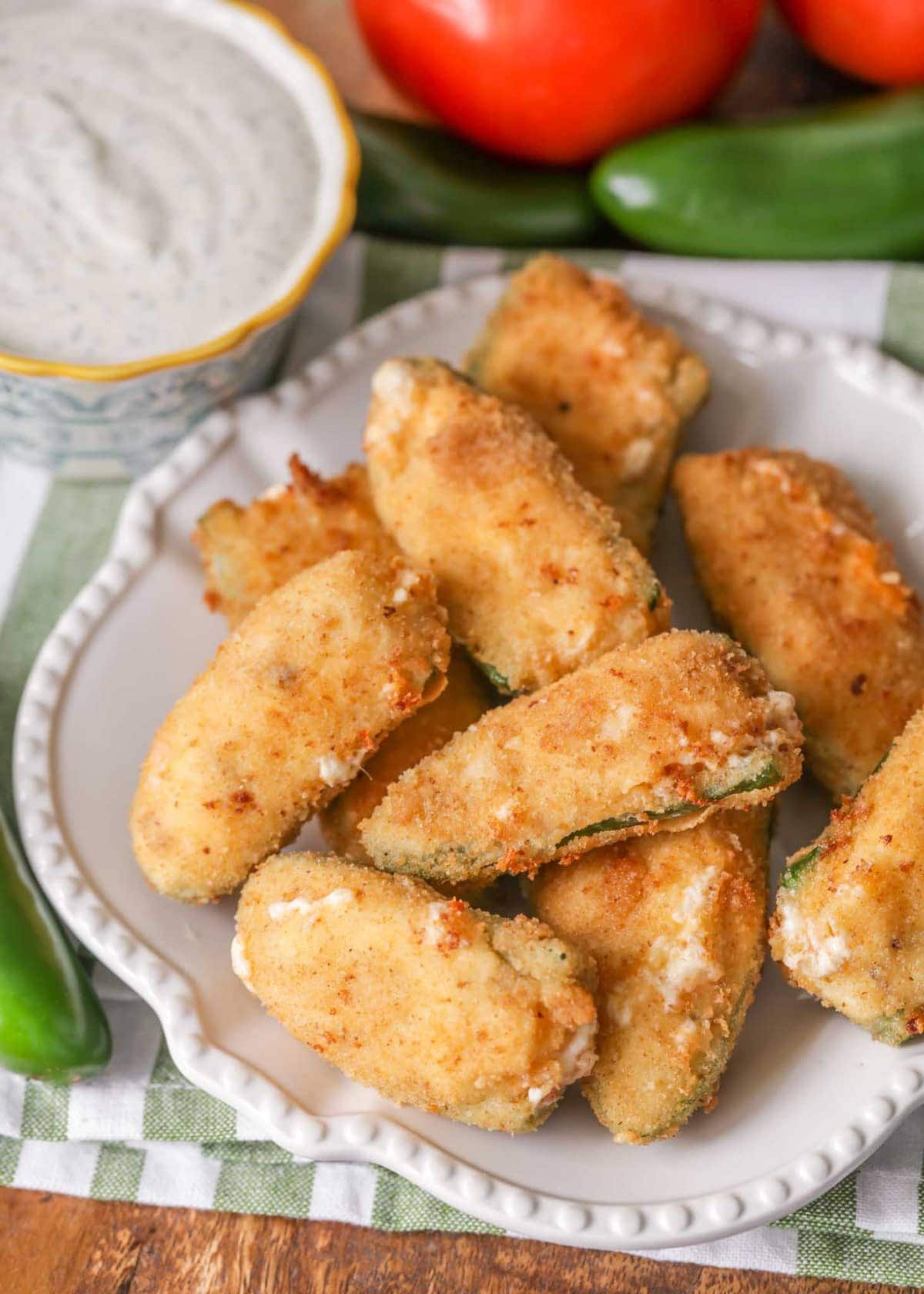 stuffed jalapeno poppers on a white plate