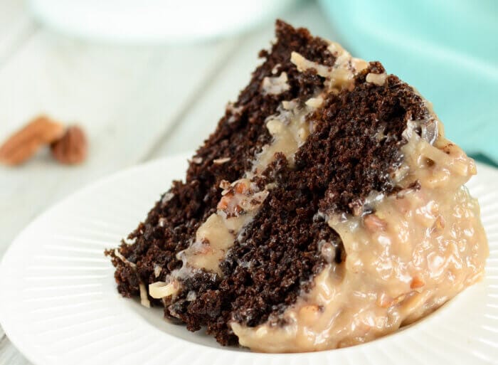 slice of German Chocolate Cake with coconut pecan frosting