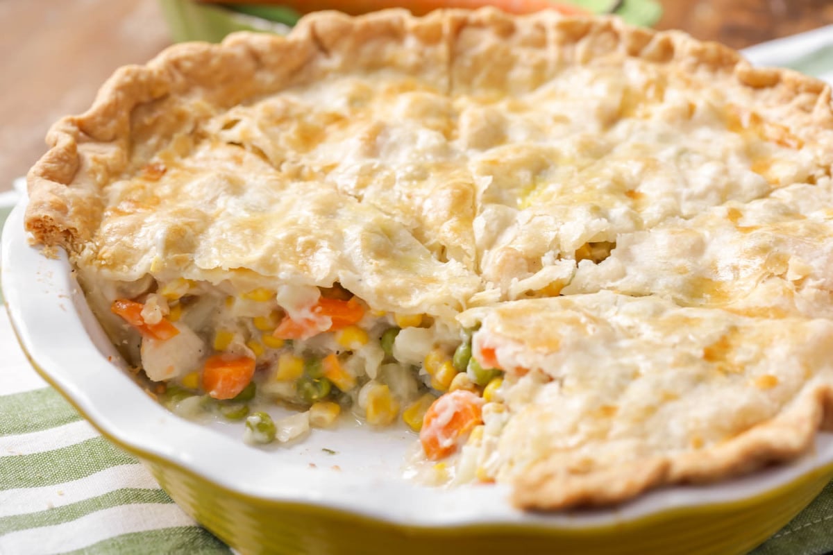Family Dinner Ideas - Chicken Pot Pie with a slice cut out.
