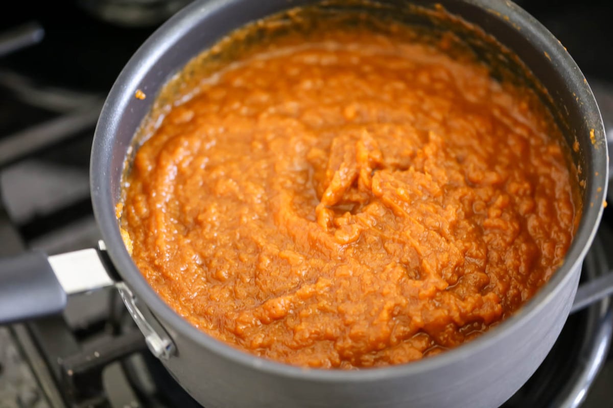 Homemade pumpkin butter in a pot on the stove
