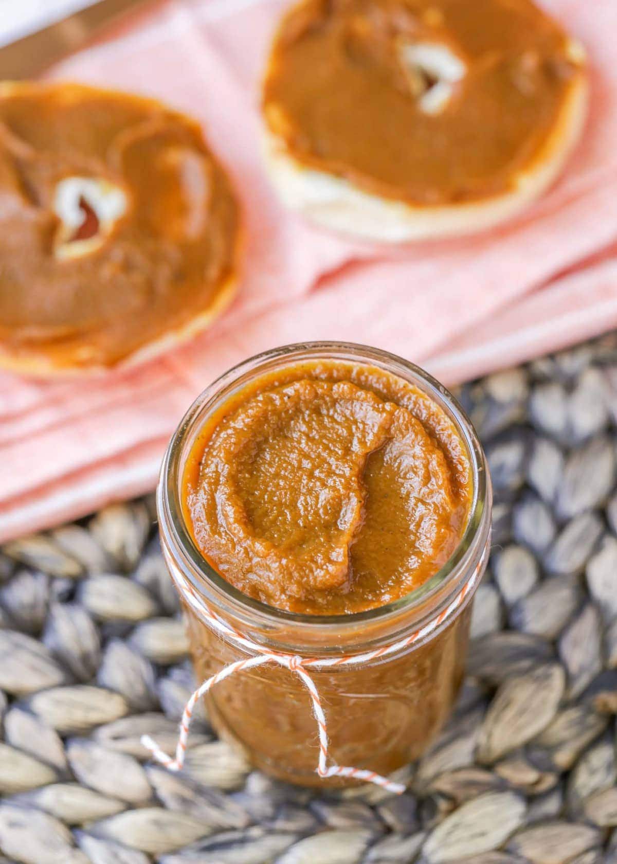 Pumpkin butter in a jar and spread on top of bagels