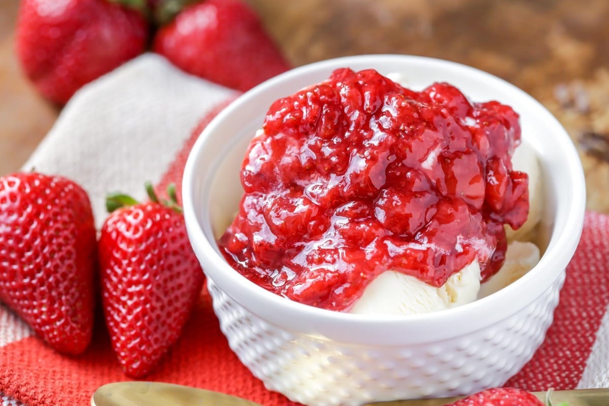 Strawberry Sauce over a bowl of vanilla ice cream