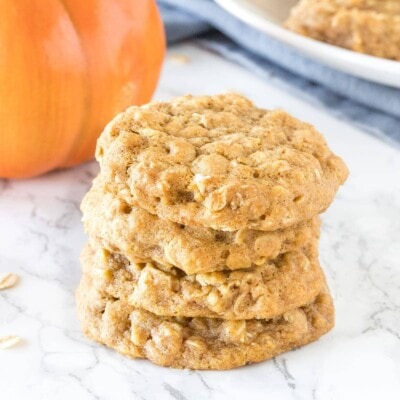 A stack of 3 soft and chewy pumpkin oatmeal cookies