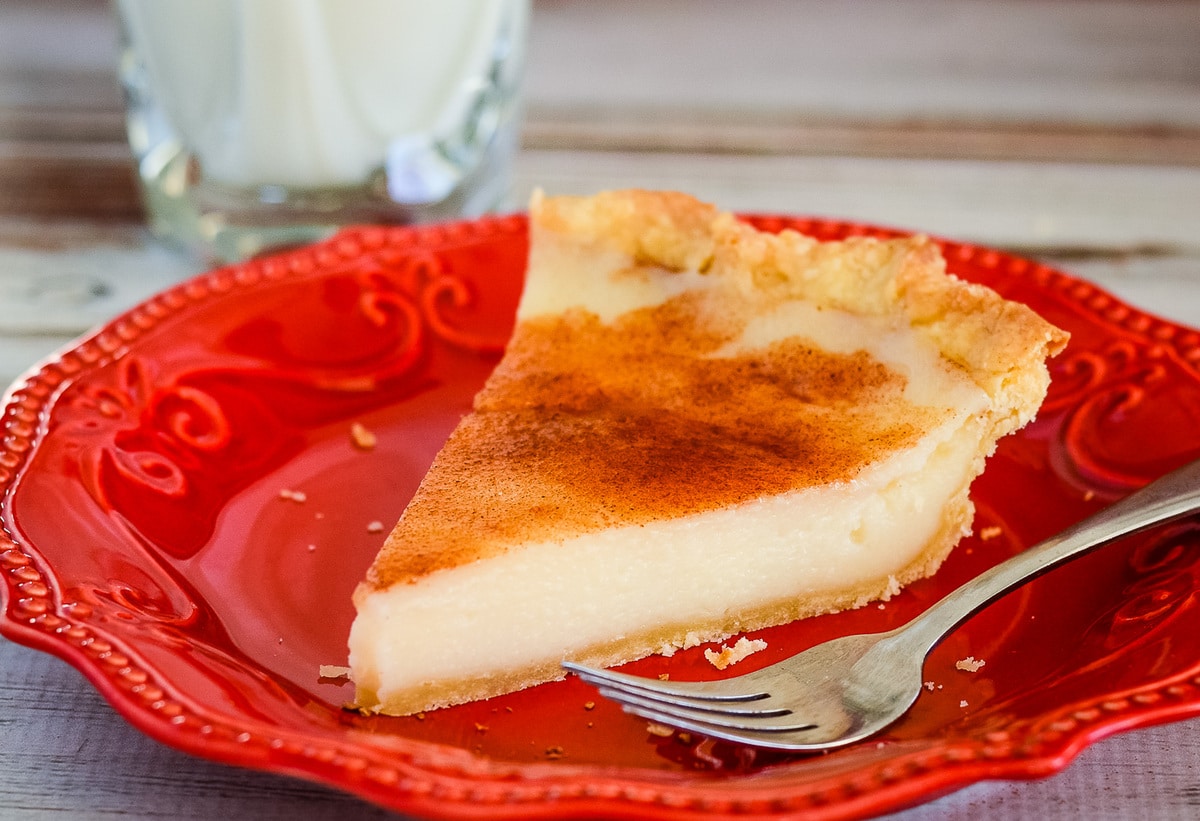 Fall dessert recipes - slice of sugar cream pie on a red plate.