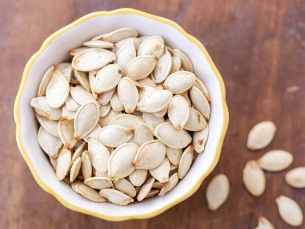 Bowl of roasted pumpkin seeds.