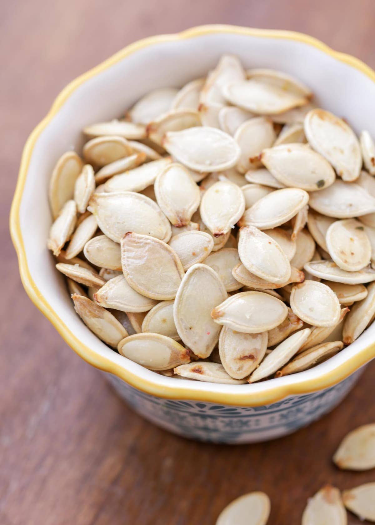 Toasted pumpkin seeds in a small dish