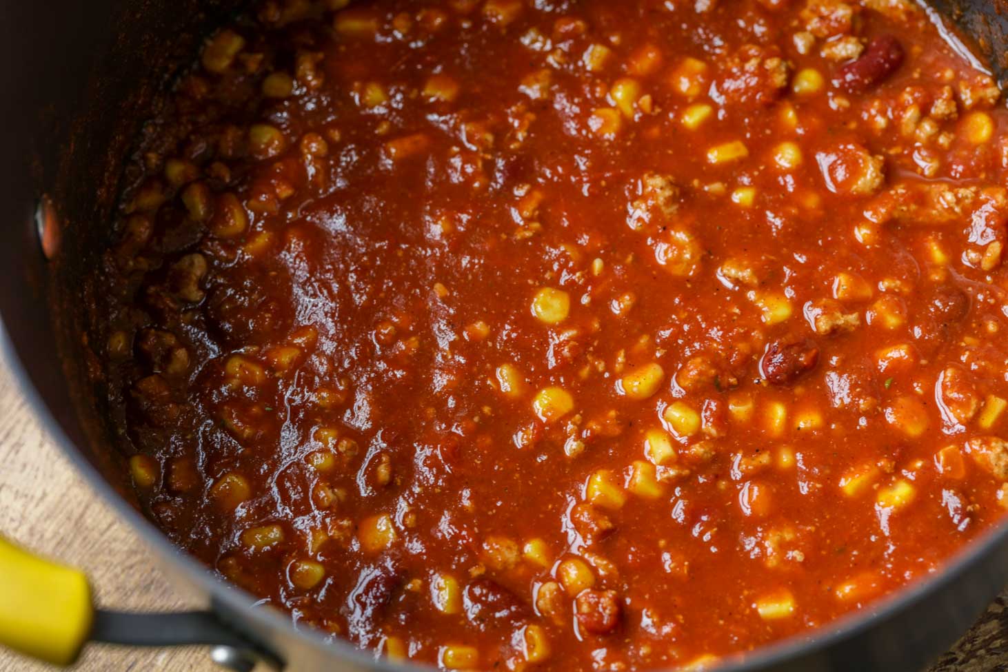 Ground turkey chili cooking in a pot