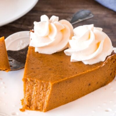 A slice of pumpkin pie without the crust.
